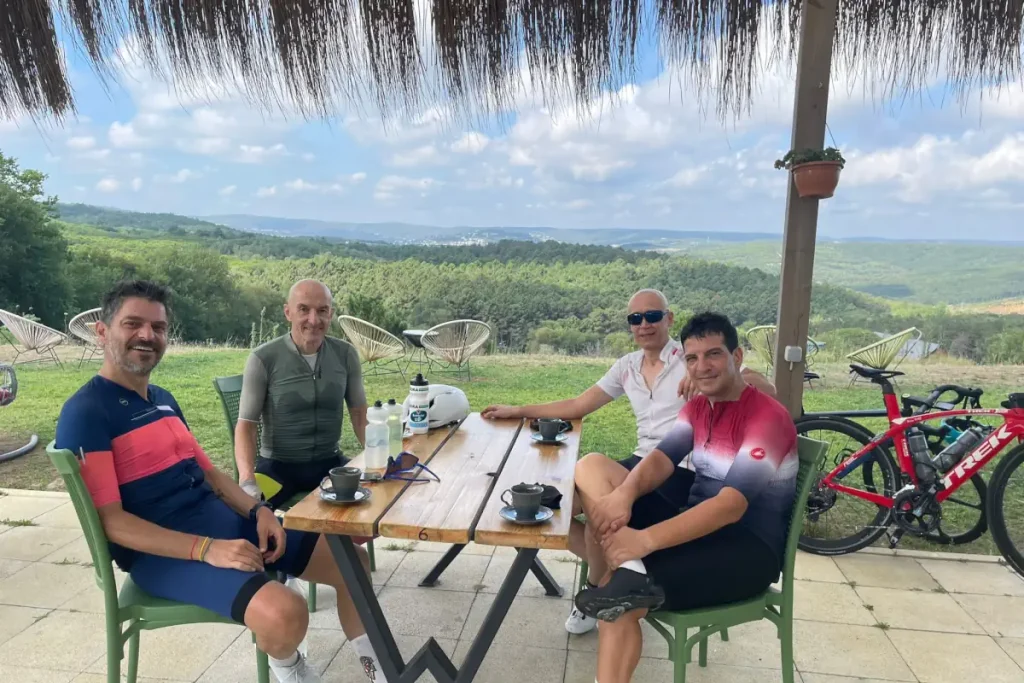 Enjoying espresso with my cycling friends at Cafe Noor in Demirciköy, taking in the breathtaking views.